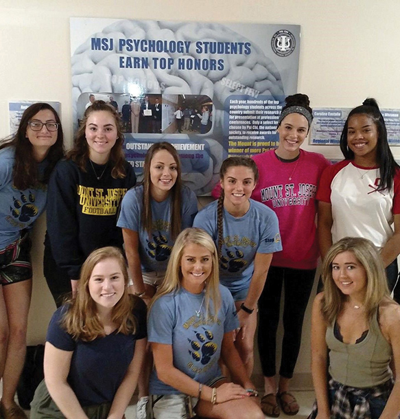 Group of MSJ Psychology students gathered together for research project.