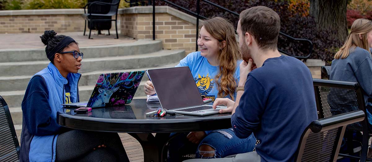 students studying in quad