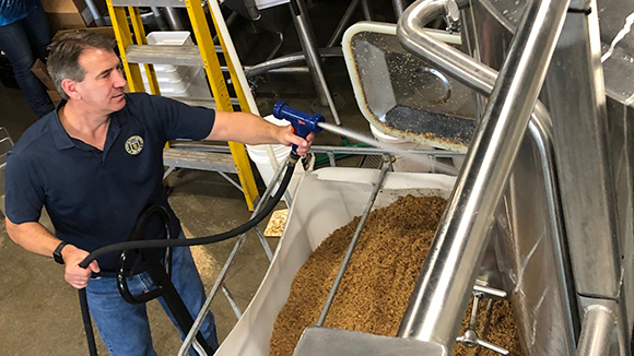 tim lawson working on brew process