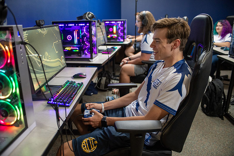 college male playing video games