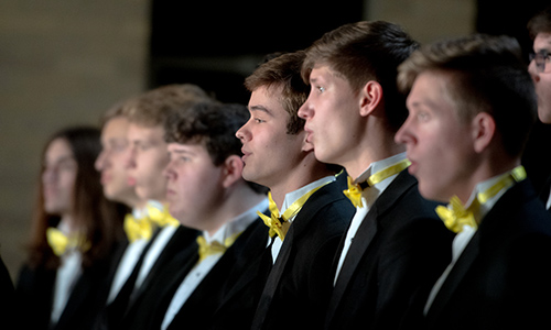 MSJ male University Singers performing in concert.