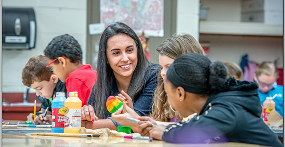 Mount St. Joseph University dual licensure student working on classroom activities with harrison students.