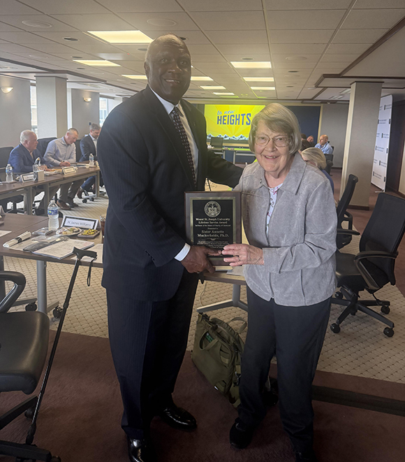 president williams standing next to sister annette
