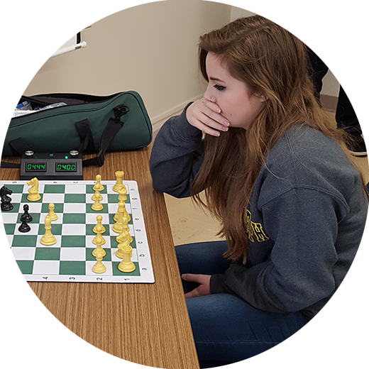 girl playing chess